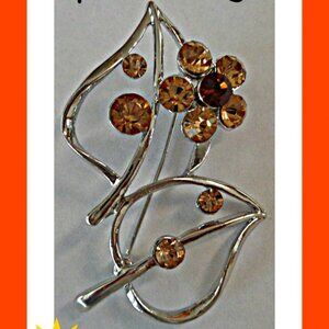 Silver Tone Flower Design Brooch With Brown Crystals